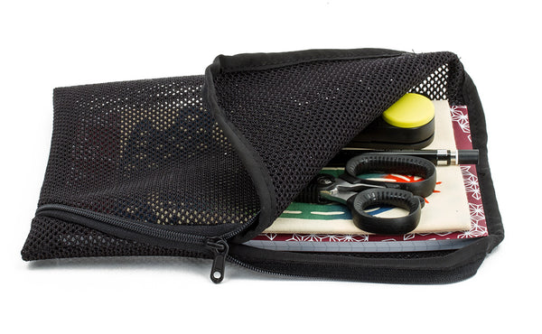 A partially open A5 Black Mesh Ghost Whale Pouch
